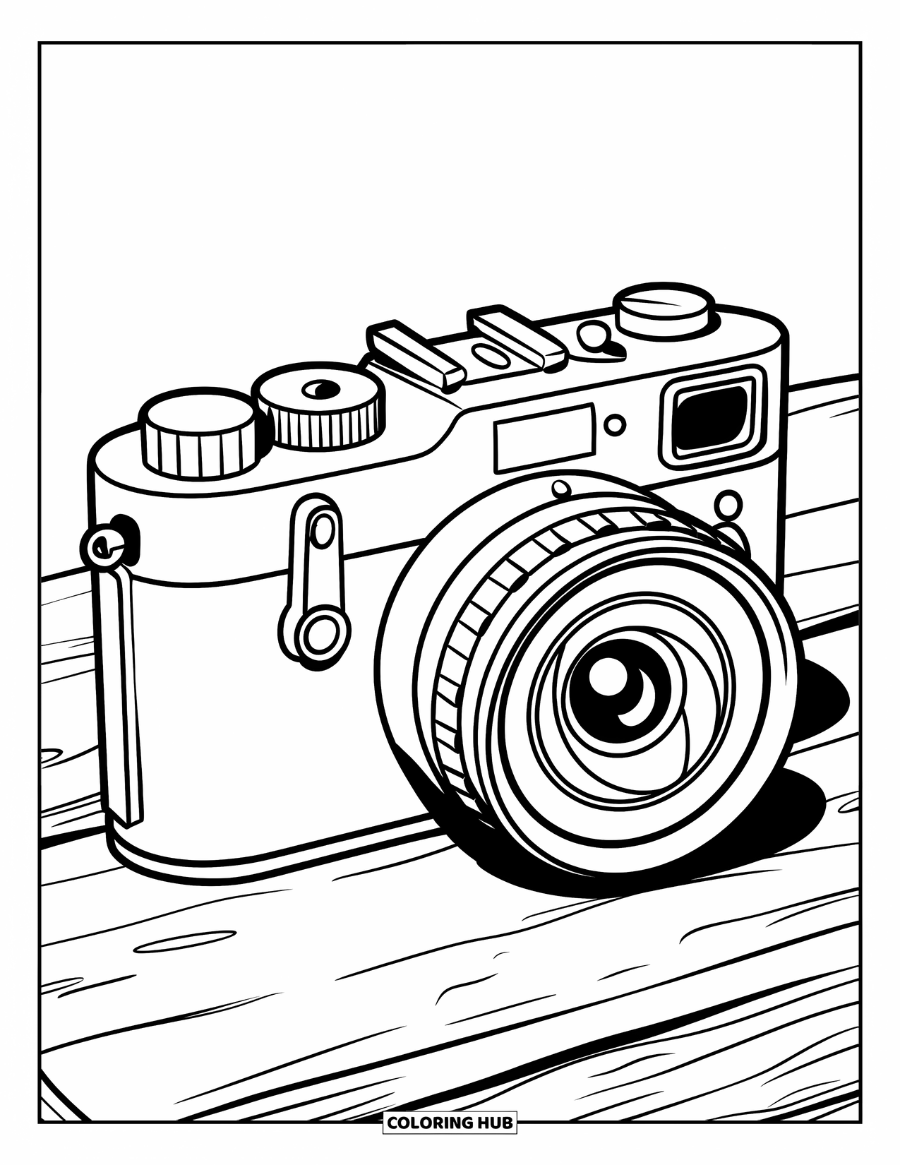 Camera Coloring Page for Kids: A chunky toy camera with round buttons sits on a wooden surface