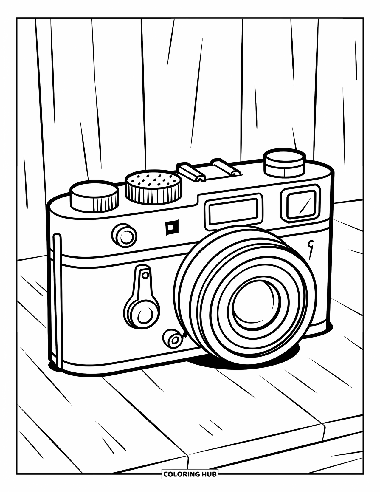 Camera Coloring Page for Kids: A wooden toy camera with big buttons sits against a clean background